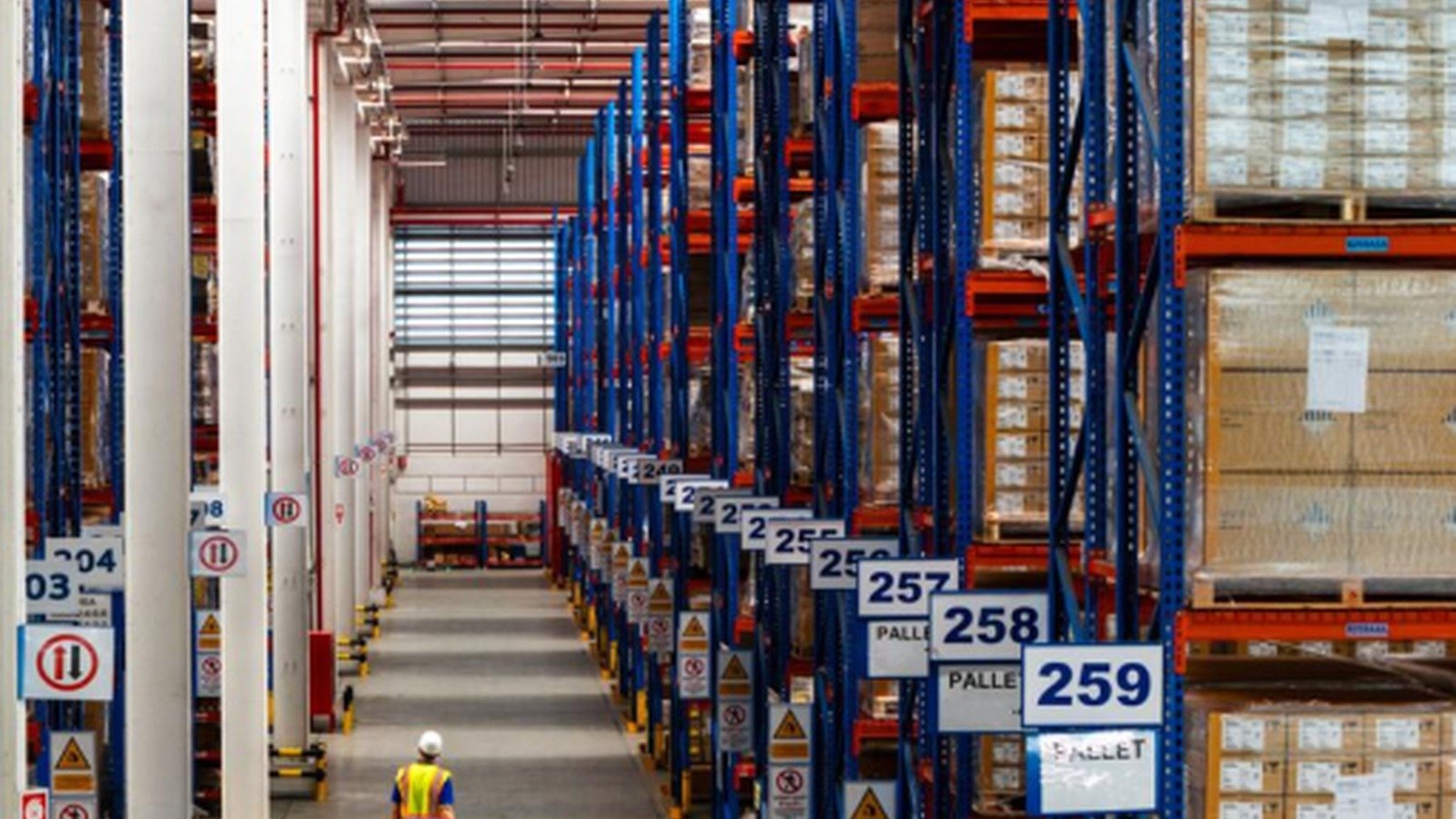 Warehouse storage aisles with cartons and pallets for ecommerce inventory